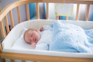Как выбрать кроватку для новорожденного